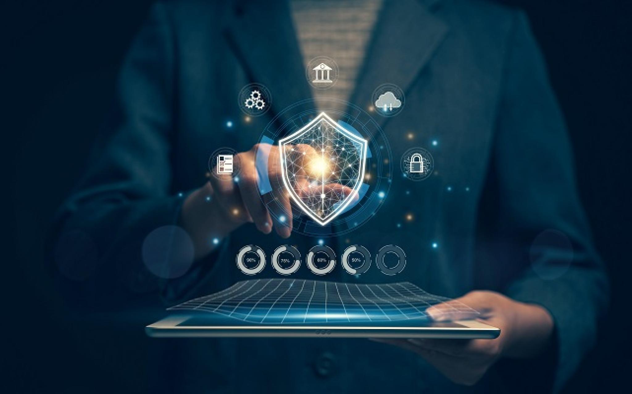 Image of a professional about to touch a tablet device with cyber security related icons hovering around her finger by Worranan from Adobe Stock used under under Education License