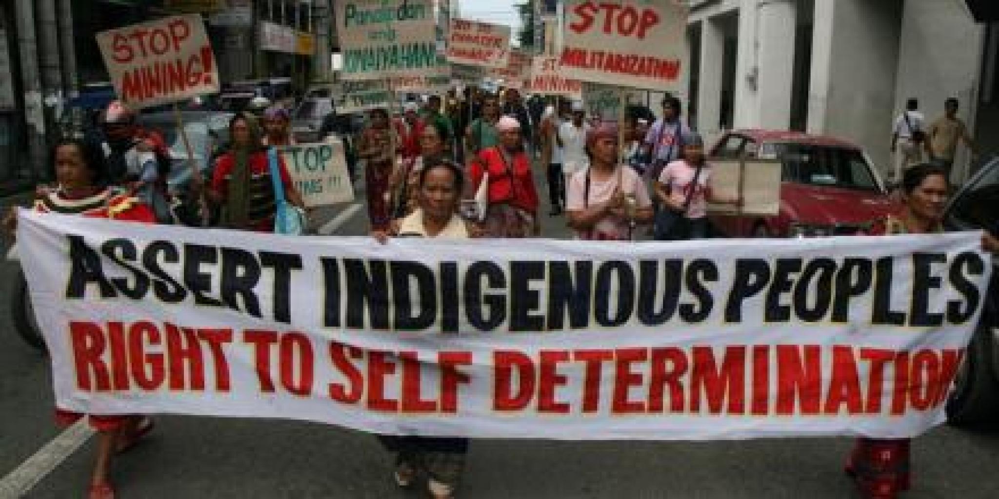 Image of Lumads marching with “Assert Indigenous Peoples right to self determination” banner in Davao City, Philippines by Keith Bacongo on flickr (https://flic.kr/p/59tNEG) (CC BY 2.0) 