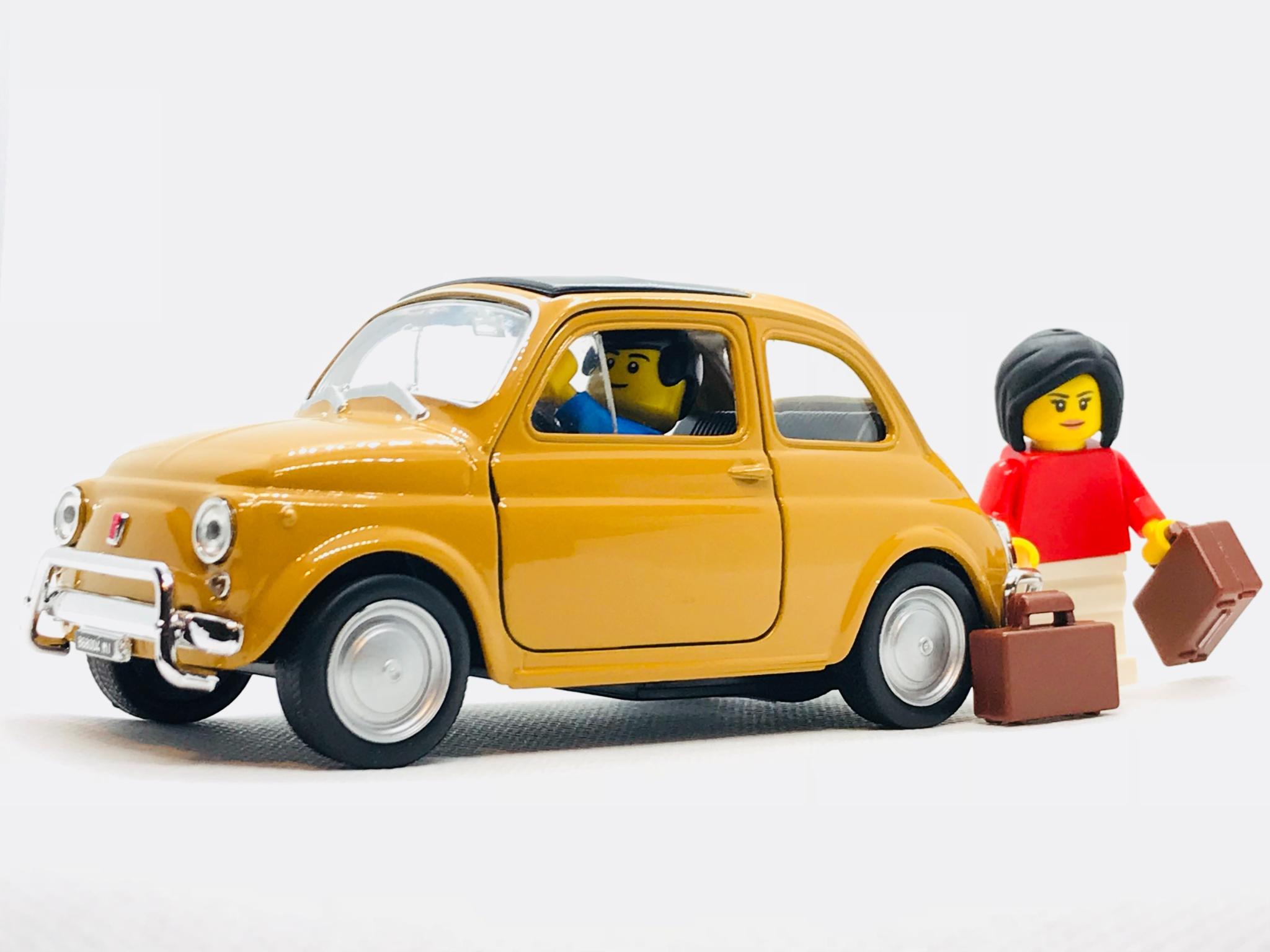 Toy car with Lego people as passengers
