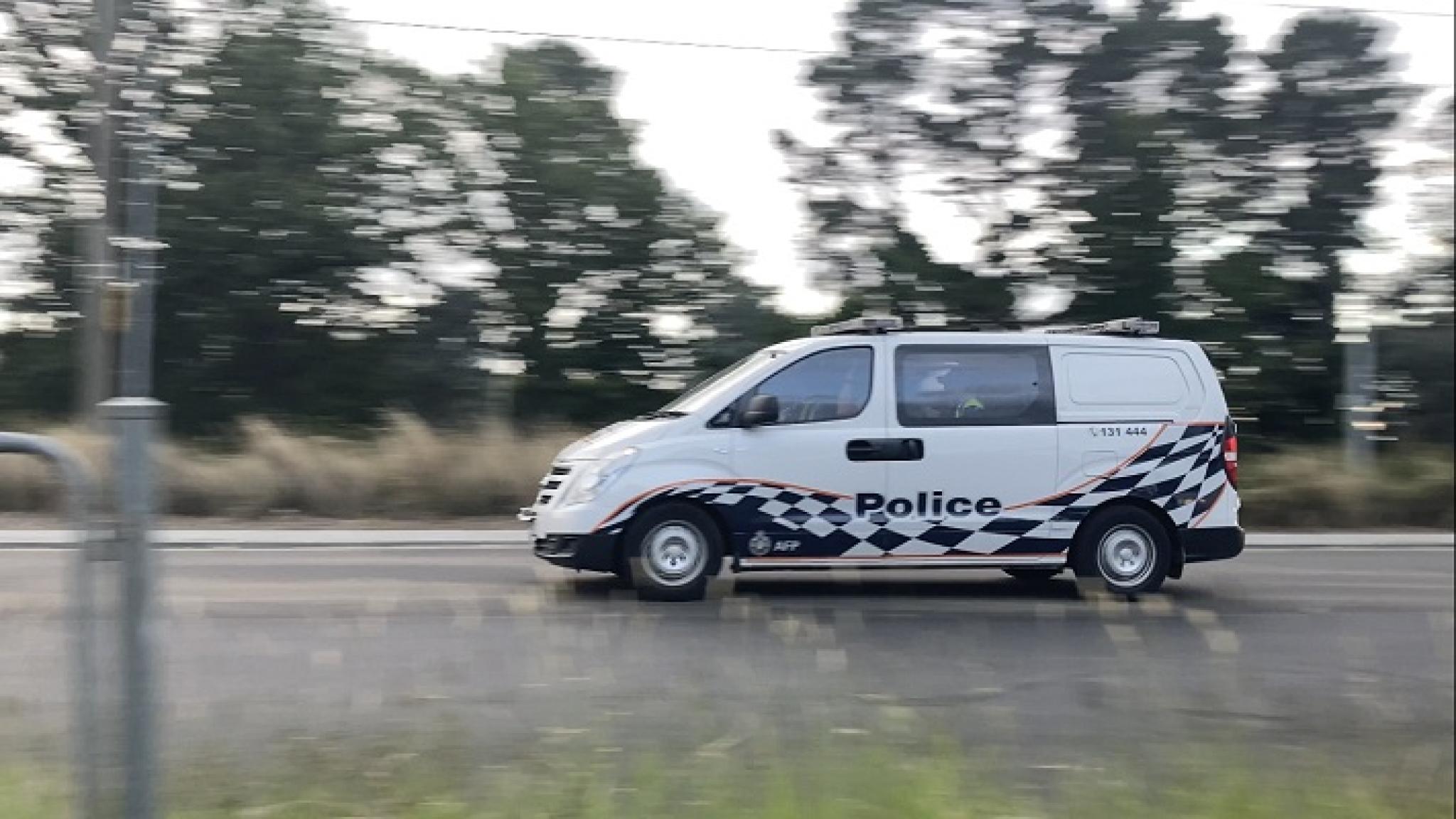 Image of ACT Policing van on the Federal Highway, ACT, by South East Australian Responses, from Wikimedia Commons, used under CC-BY-SA-4.0 licence.
