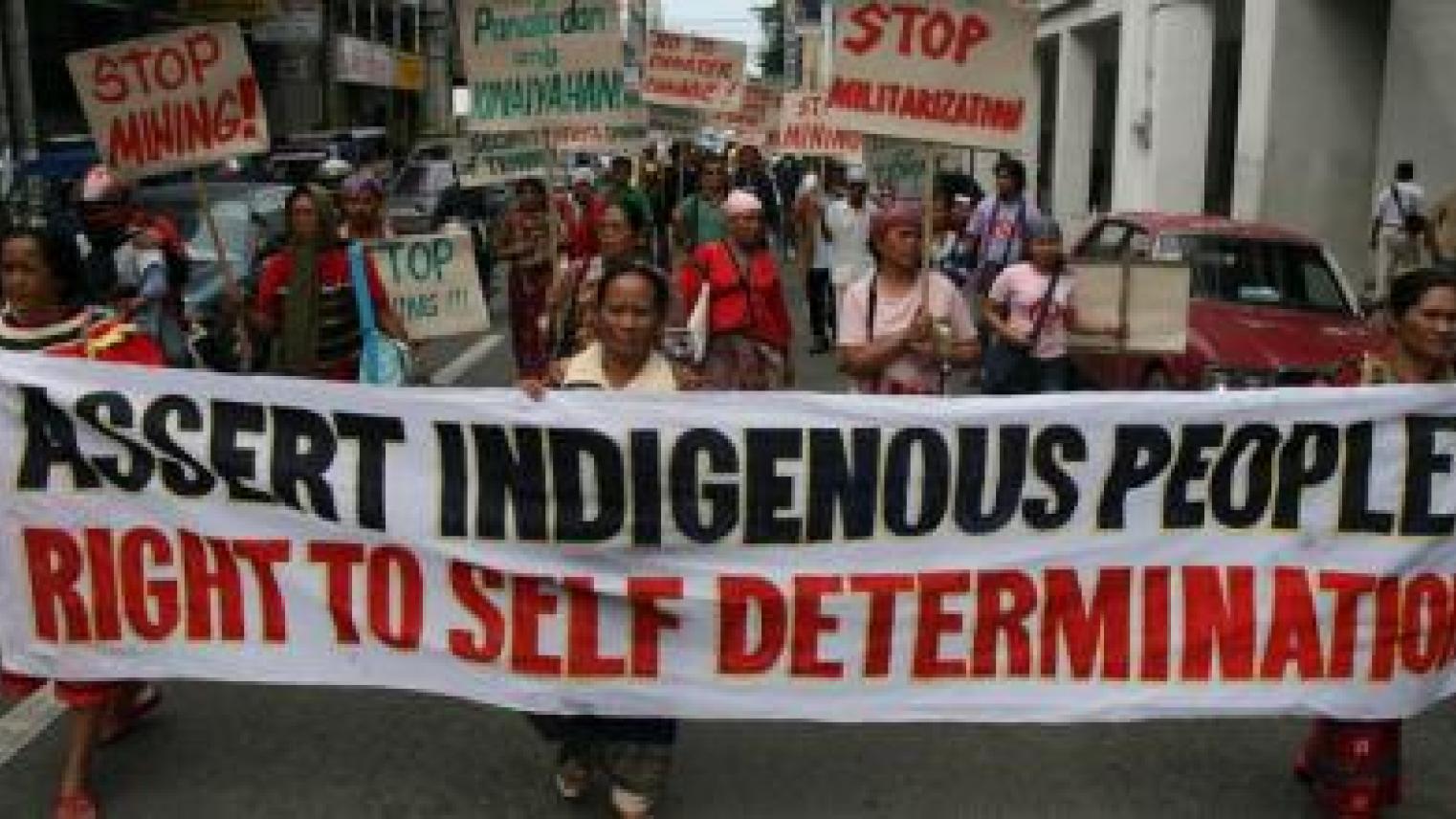 Image of Lumads marching with “Assert Indigenous Peoples right to self determination” banner in Davao City, Philippines by Keith Bacongo on flickr (https://flic.kr/p/59tNEG) (CC BY 2.0) 
