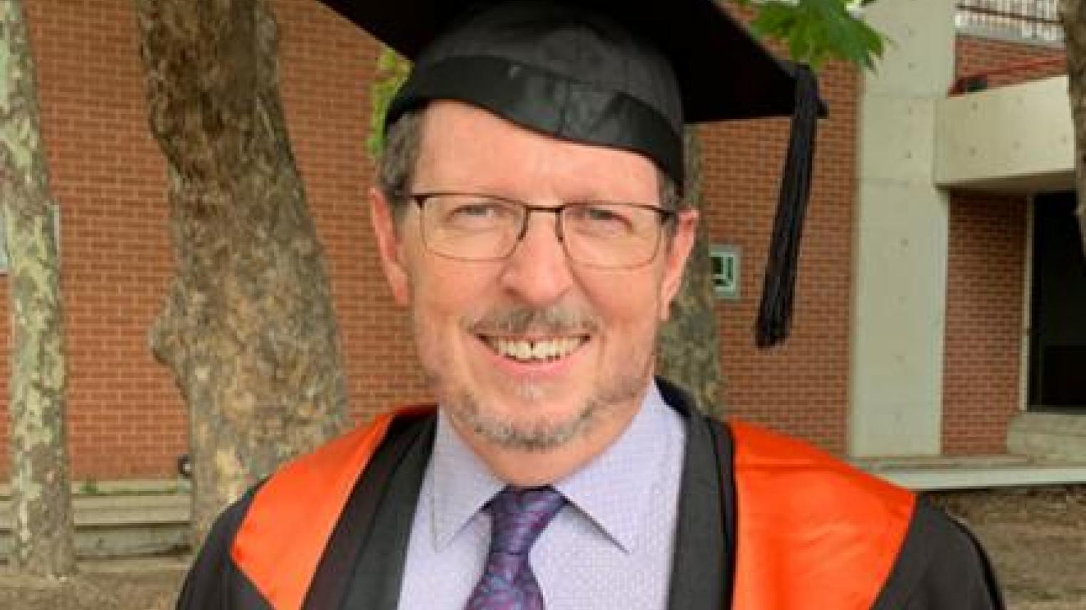 Michael Stone after December 2019 Conferring of Awards Ceremony. Image by Michael Stone