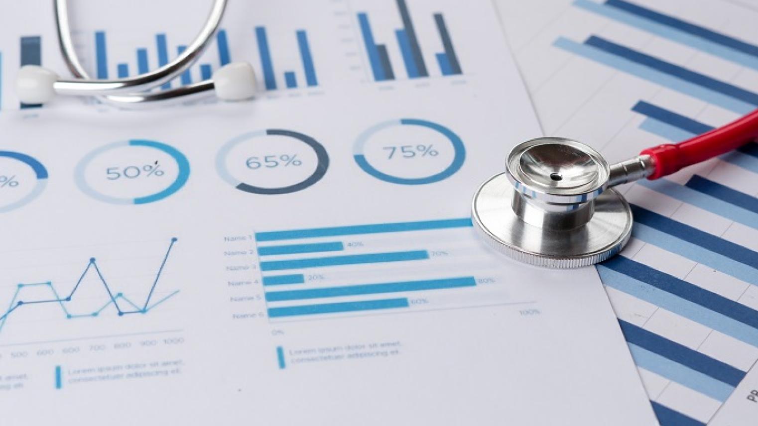 Image of stethoscope on top of pages of charts by PaeGAG used under Adobe Education License 