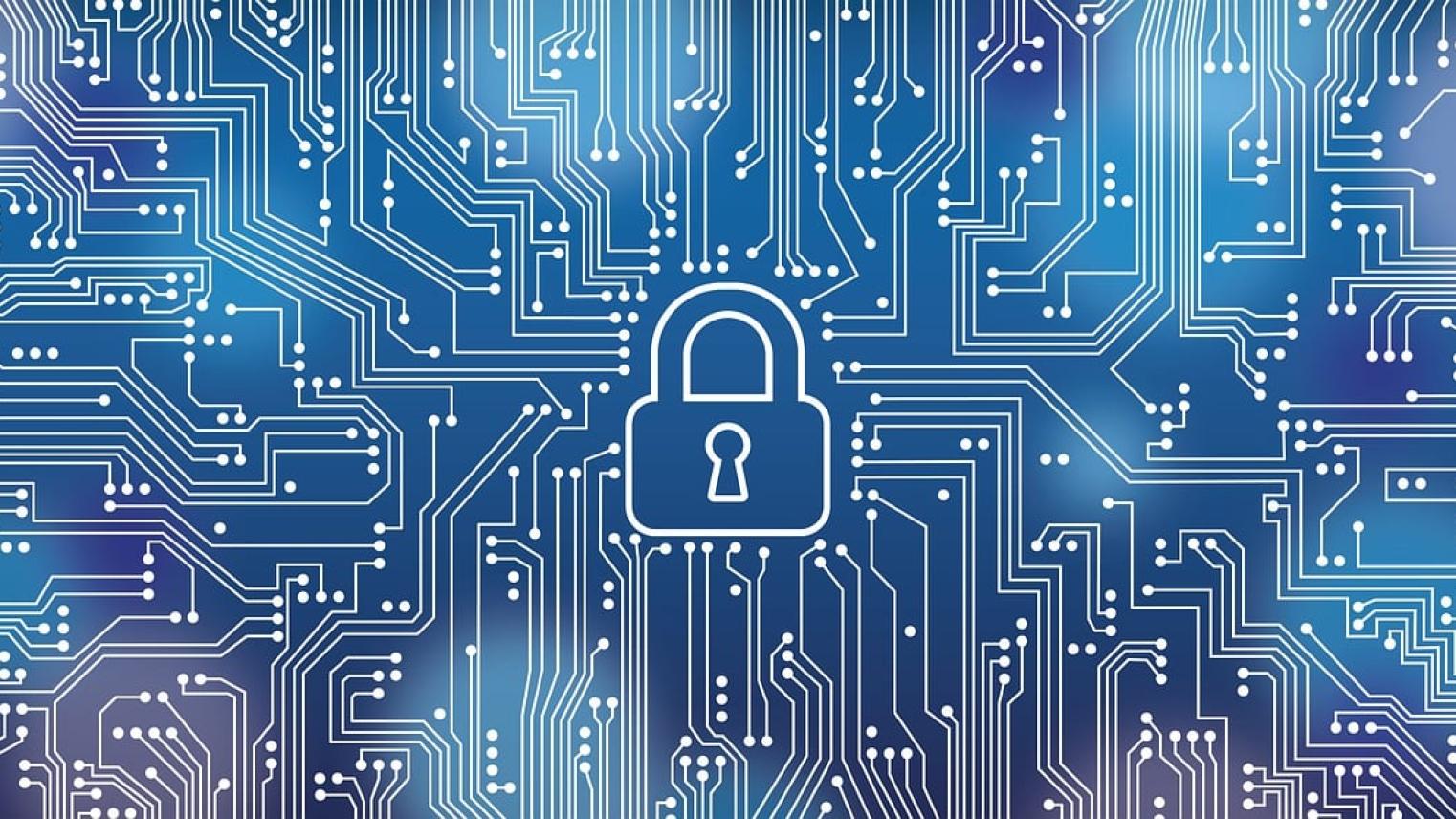 Image of circuit board with lock in the middle, suggesting IT security, by akitada31 on pixabay, free to use under Pixabay license